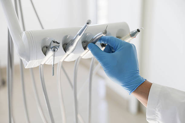 Professional Emergency Dentist technician working in Cherry Creek, CO